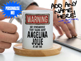 Angelina Jolie Mug – Being held coaster with man using laptop – WARNING Design