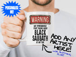 Black Sabbath Mug held by bearded man - WARNING May Start Talking About