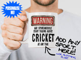 Cricket Mug held by bearded man - WARNING Design