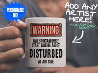Disturbed Mug held by man in grey tee shirt – WARNING Design