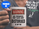 Disturbed Mug held by man in grey tee shirt – WARNING Design