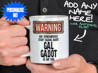 Gal Gadot Mug - held by man in black shirt - WARNING Design