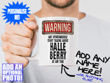 Halle Berry Mug held out by man with beard – WARNING Design