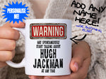 Hugh Jackman Mug – held by woman in knitted jumper