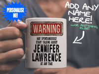 Jennifer Lawrence Mug - held by man in grey v-neck tee – WARNING Design