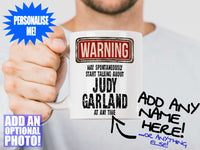 Judy Garland Mug held out by man with beard – WARNING Design