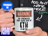 KTM Mug - held by man in black shirt – WARNING Design