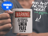 Linkin Park Mug held by man in grey tee shirt – WARNING Design