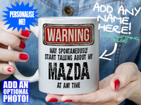 Mazda Mug - held by woman in denim jacket