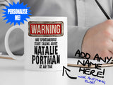 Natalie Portman Mug – on desk with man writing on clipboard – WARNING Design