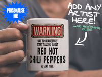 Red Hot Chili Peppers Mug held by man in grey tee shirt – WARNING Design