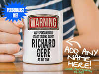 Richard Gere Mug – on wooden table with striped t-shirt