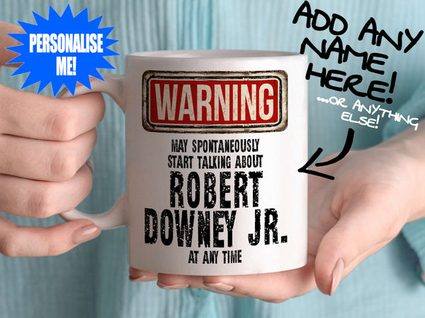 Robert Downey Jr Mug - held by woman in turquoise blouse - Shortcut
