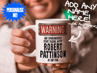 Robert Pattinson Mug held by smiling woman – WARNING Design
