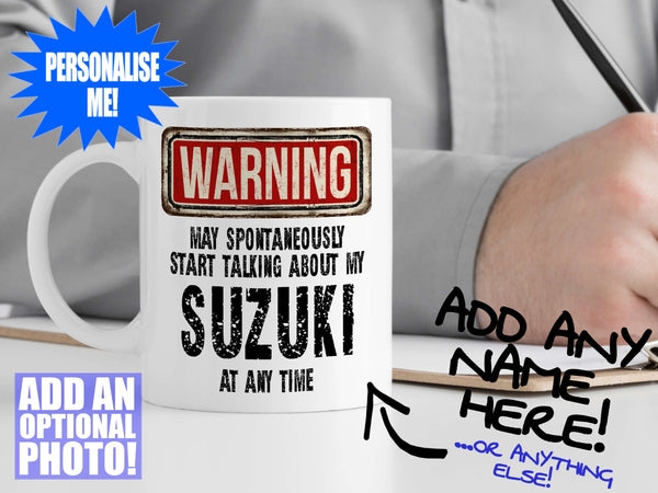 Suzuki Mug – on desk with man writing on clipboard – WARNING Design