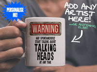 Talking Heads Mug held by man in grey tee shirt – WARNING Design