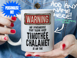 Timothée Chalamet Mug - held by woman in denim jacket