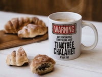 Timothée Chalamet Mug with coffee and pastries – WARNING Design