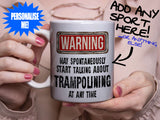 Trampolining Mug - held by woman in pink blouse
