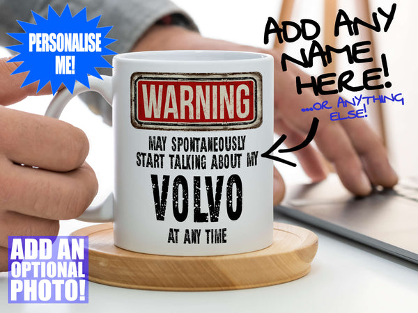 Volvo Mug – Being held on coaster with man using laptop – WARNING Design
