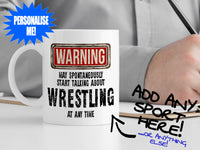 Wrestling Mug with man writing notes – WARNING Design