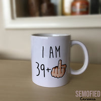 I am 39 + Middle Finger Mug - 40th Birthday Cup on Sideboard