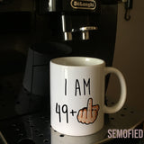 I am 49 + Middle Finger Mug - 50th Birthday Cup on Coffee Machine