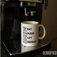 Eat Sleep Lift Repeat Mug on Coffee Machine