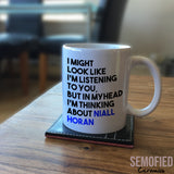 Thinking about Niall Horan - Mug on Coffee Table
