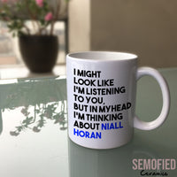 Thinking about Niall Horan - Mug on Glass Table