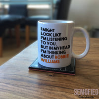 Thinking About Robbie Williams - Mug on Coffee Table